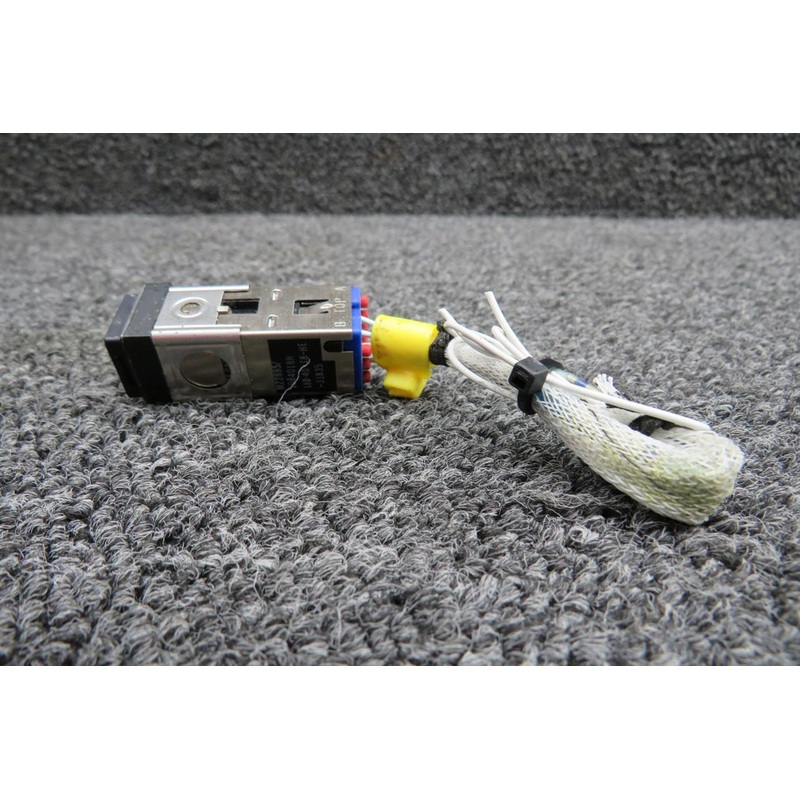 M22885-1084018H Aerospace Optics TERR Push Button Illuminated Switch (Dented)